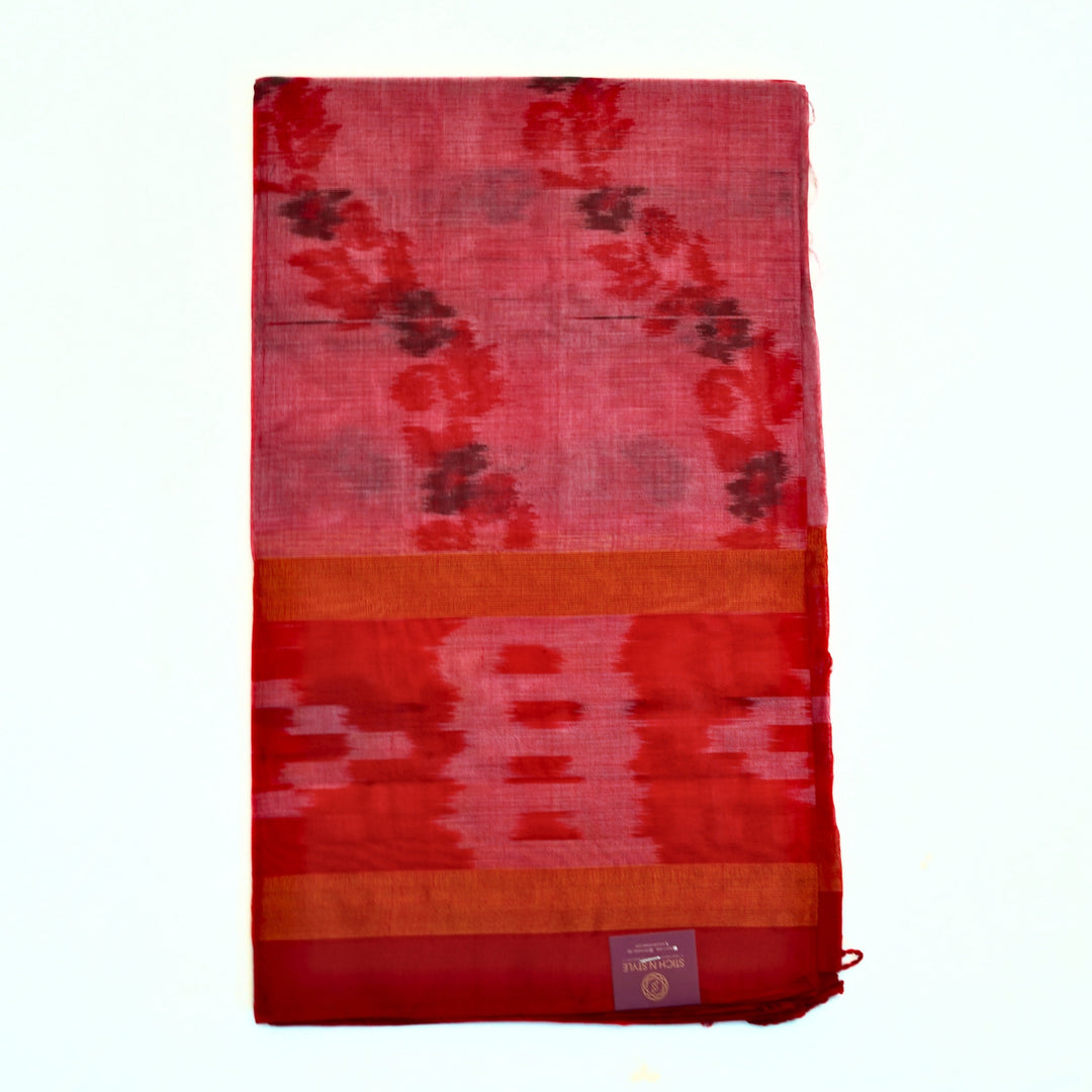 Ikkat cotton saree with small zari border.