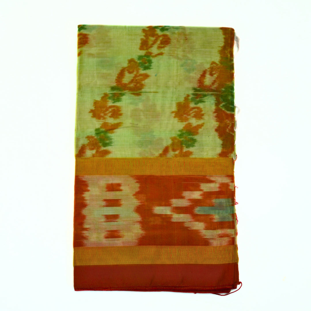 Ikkat cotton saree with small zari border.
