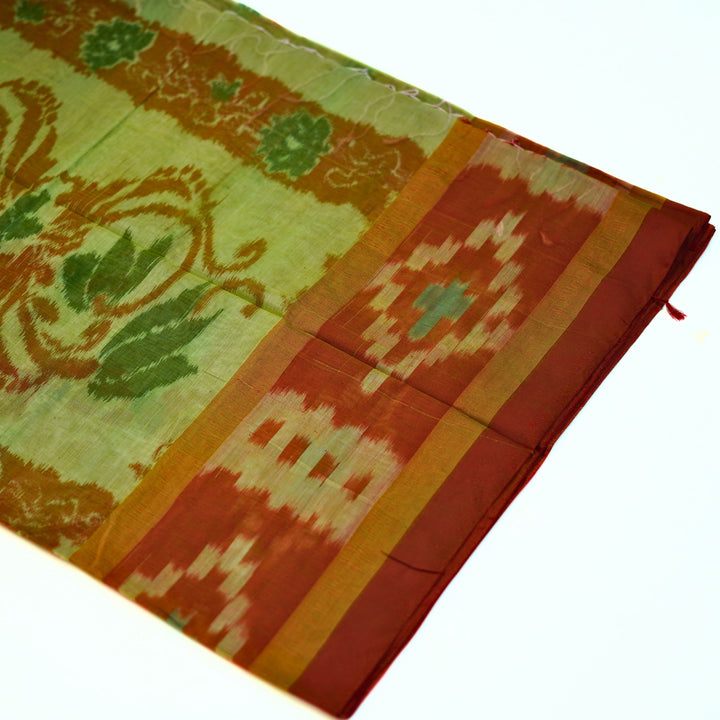 Ikkat cotton saree with small zari border.