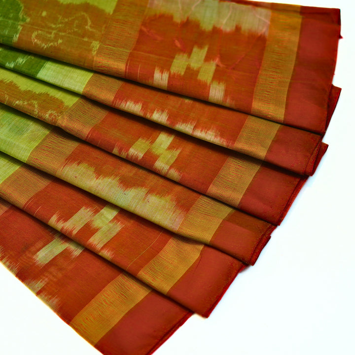 Ikkat cotton saree with small zari border.