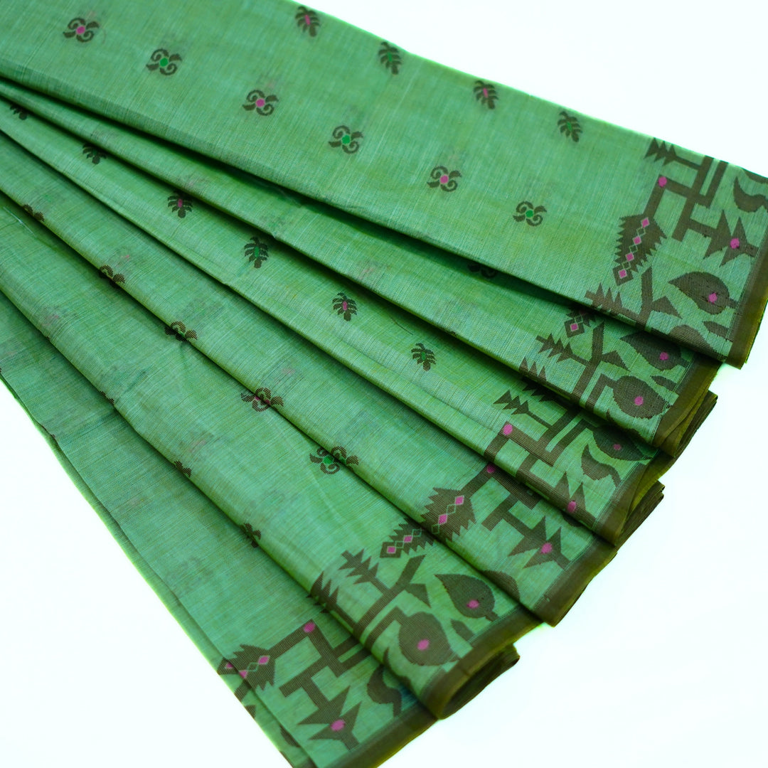 Cotton saree with all over floral weaving, with weaving border.