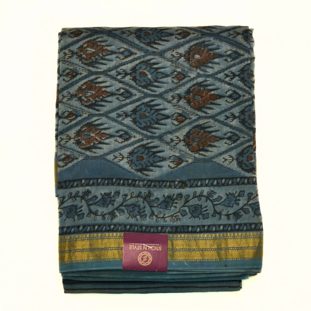 Pure maheswari silk with ikkat and zari border.