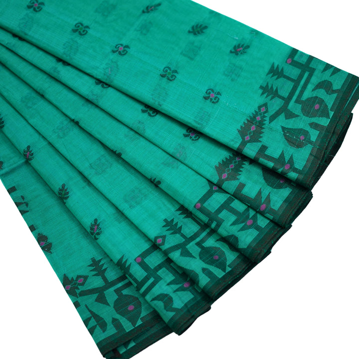 Cotton saree with all over floral weaving, with weaving border.