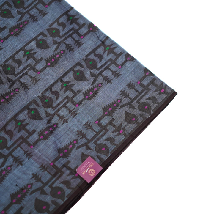 Cotton saree with all over floral weaving, with weaving border.