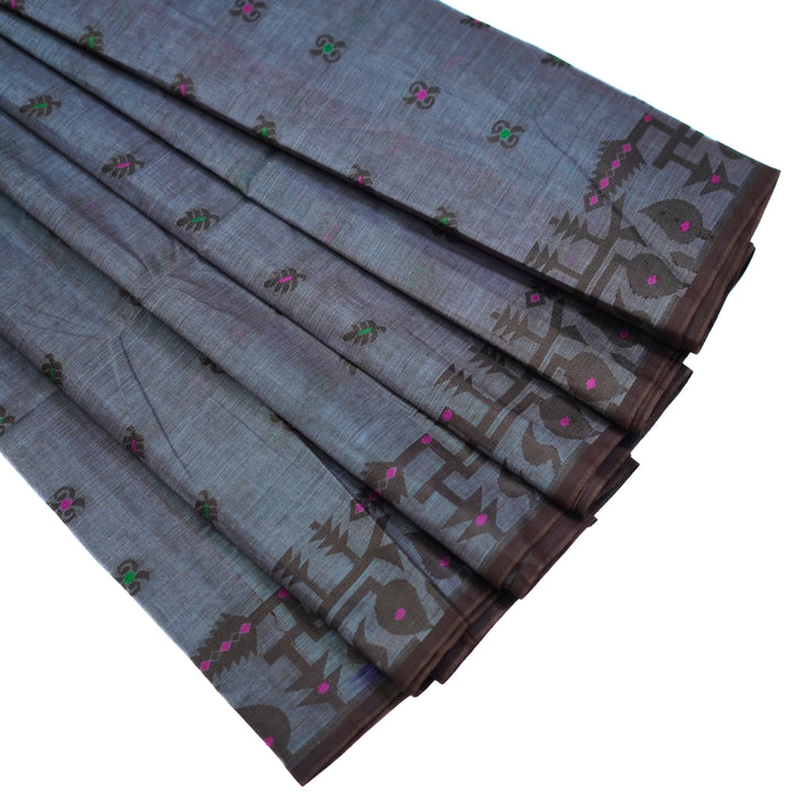 Cotton saree with all over floral weaving, with weaving border.