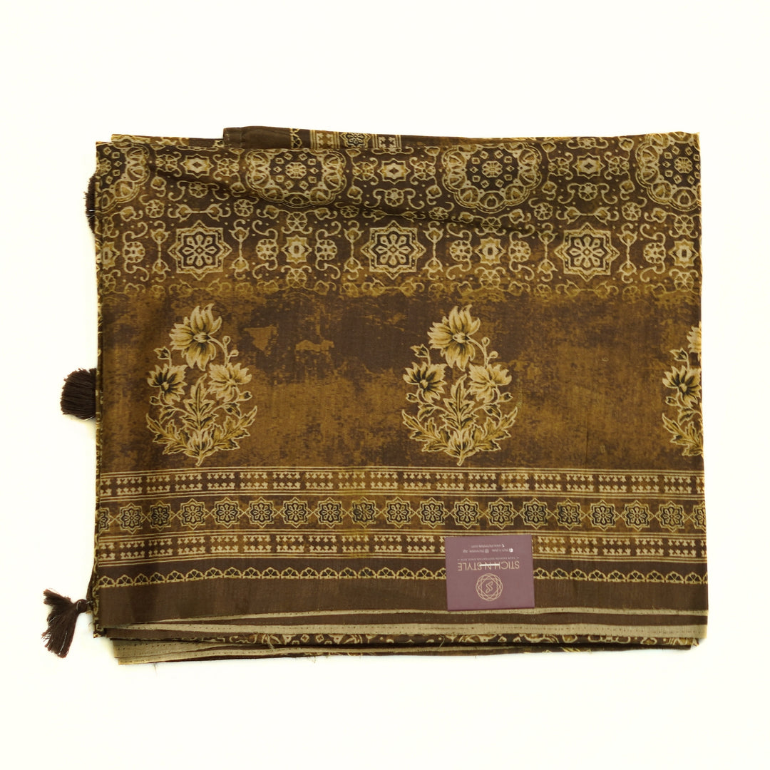 Tussar digital print saree with allover floral motif and border. Paired with a matching blouse