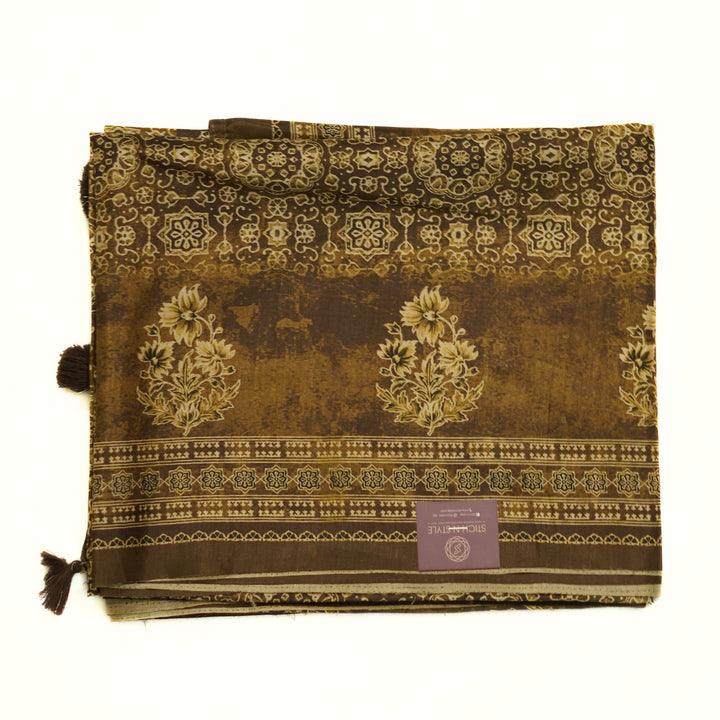 Tussar digital print saree with allover floral motif and border. Paired with a matching blouse