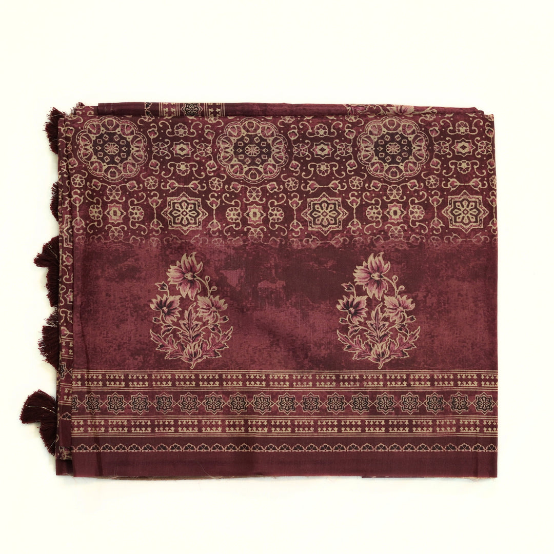 Tussar digital print saree with allover floral motif and border. Paired with a matching blouse