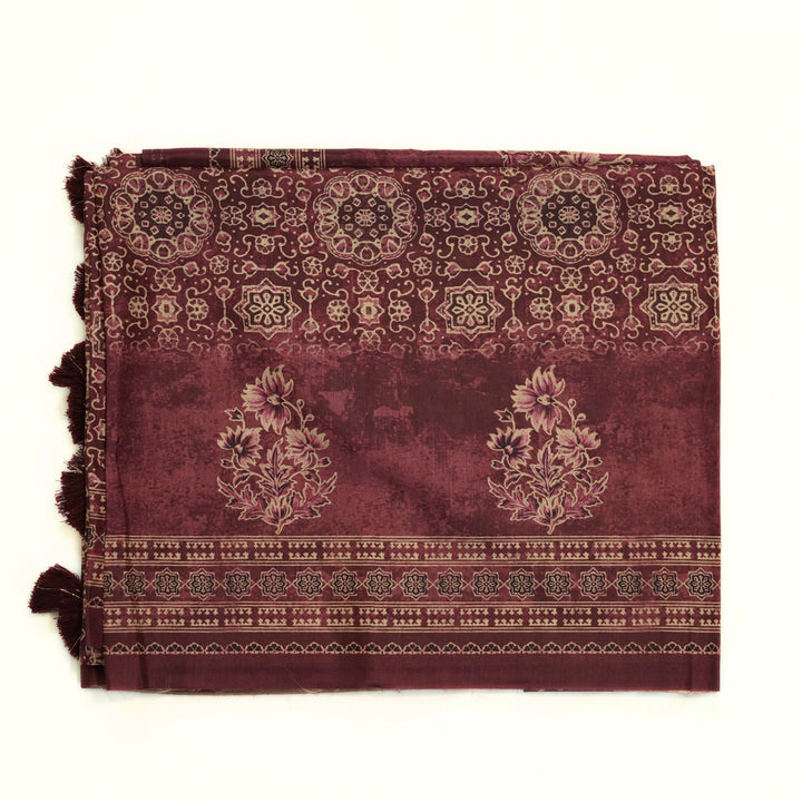 Tussar digital print saree with allover floral motif and border. Paired with a matching blouse