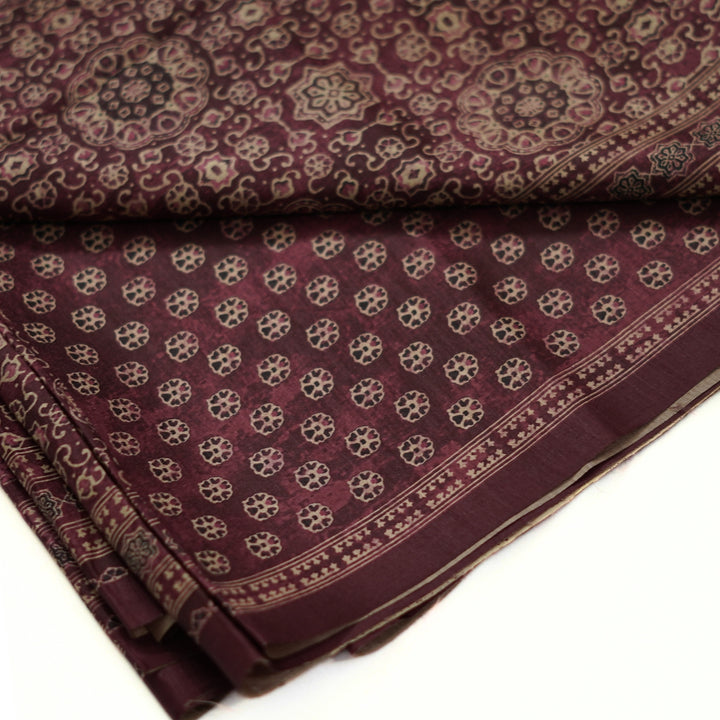 Tussar digital print saree with allover floral motif and border. Paired with a matching blouse