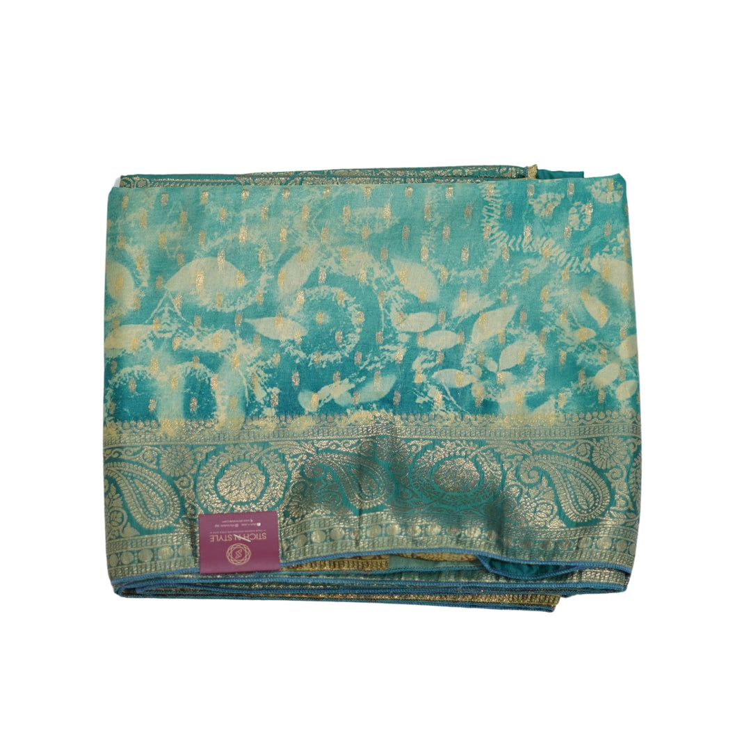 Russian silk with Zari border and abstract design.